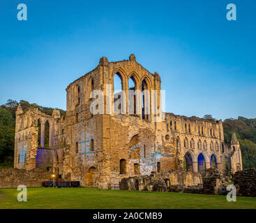 ILLUMINATING RIEVAULX event at Rievaulx Abbey, North Yorkshire, UK. Featuring Museum of the Moon, by Luke Jerram. Stock Photo