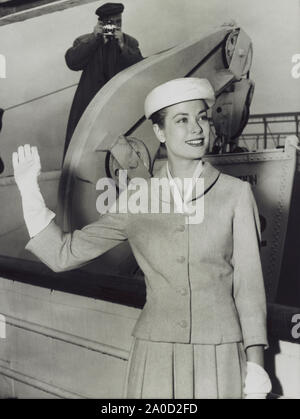 Movie star Grace Kelly waves goodbye to New York as she prepares to board the ocean liner Constitution to sail to Monaco where she will wed Prince Rainier of Monaco. Princess Grace died at Monaco Hospital on September 14, 1982, succumbing to injuries sustained in a traffic collision the day before. At the time of her death, she was 52 years old. Stock Photo