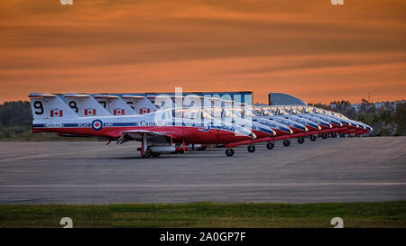 Peterborough, Ontario, Canada - September 19, 2019:  At sunset, The Canadian Forces Snowbirds tutor jets, sit on the tarmac ready for the 50th anniver Stock Photo