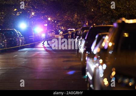 Washington, DC, USA. 19th Sep, 2019. Police officers stand guard near the shooting scene in Washington, DC, the United States, on Sept. 19, 2019. One person was killed and five others were injured in a shooting Thursday night in northern Washington, DC, police said. Credit: Liu Jie/Xinhua/Alamy Live News Stock Photo