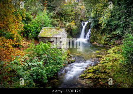 The Grot and Waterfall, Rydal Hall, Cumbria. Stock Photo