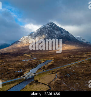 Aerial view of buachaille etive mor in Glencoe Scotland and the A82 road bridge. Stock Photo