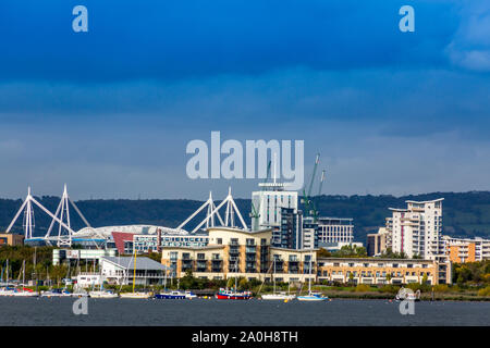 An interesting selection of architectural styles and buildings visible across Cardiff Bay behind the new barrage, Glamorgan, Wales, UK Stock Photo