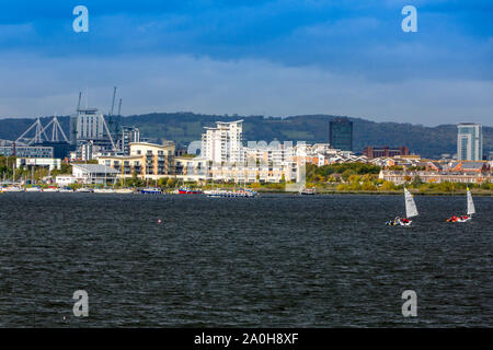 An interesting selection of architectural styles and buildings visible across Cardiff Bay behind the new barrage, Glamorgan, Wales, UK Stock Photo