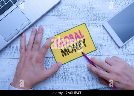 Conceptual hand writing showing Global Money. Concept meaning International finance World currency Transacted globally Stock Photo