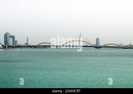 The famous golden Dragon Bridge in Da nang City in Vietnam Stock Photo