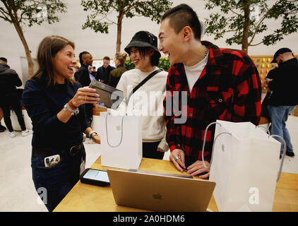 Customers attend the Apple iPhone 11 launch at the tech giant's flagship store in Regent Street, central London. Stock Photo