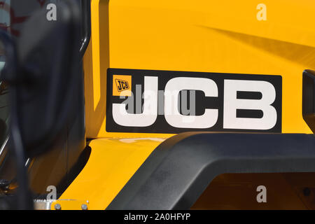 Kaunas, Lithuania - April 04: JCB heavy duty equipment vehicle and logo in Kaunas on April 04, 2019.  JCB corporation is manufacturing equipment for c Stock Photo