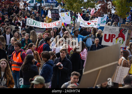 Students, parents and activists take part in a march during the global climate strike day to demand action be taken on climate change.In over 150 countries, people are stepping up to support young climate strikers and demand an end to the age of fossil fuels. Stock Photo