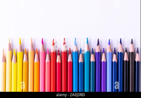 Education or Back to school concept. Various Colored Pencils isolated on white background with copy space for text. Stock Photo