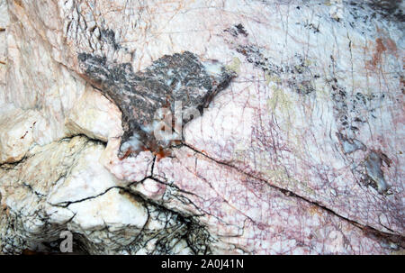 Textured stone with fissures abstract background Stock Photo