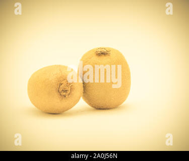 Studio shot two fresh raw kiwi fruits isolated on white Stock Photo