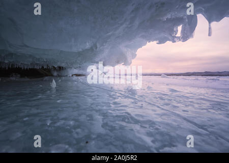 Ice cave in Baikal lake. Stock Photo