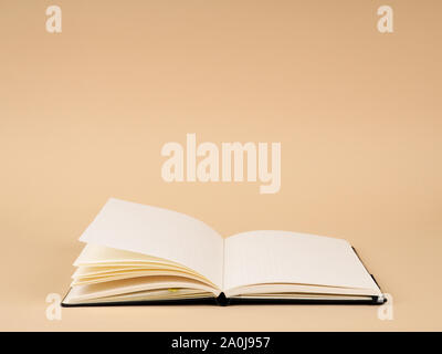 Blank open notepad. On vintage wooden background Stock Photo