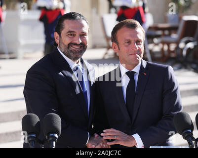 Paris, France. 20th Sep, 2019. French President Emmanuel Macron (R) shakes hands with visiting Lebanese Prime Minister Saad Hariri before their meeting at the Elysee Palace in Paris, France, Sept. 20, 2019. Credit: Gao Jing/Xinhua/Alamy Live News Stock Photo