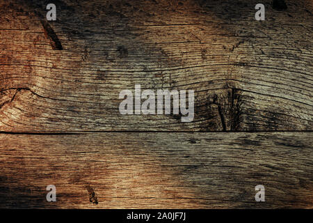 Grunge worn wooden surface texture with shadow pattern from above Stock Photo