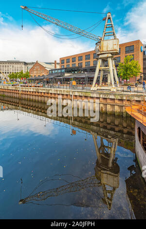 TRONDHEIM, NORWAY - SEPTEMBER 07, 2019: A modern shopping centre consisting of 60 shops, in the buildings of the old shipyard. By the dock outside, th Stock Photo