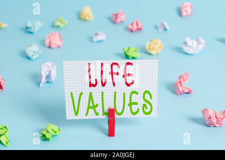 Conceptual hand writing showing Life Values. Concept meaning things that you believe are important in the way you live Colored clothespin rectangle sh Stock Photo