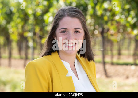 Palatinate, Germany. 20th Sep, 2019. Miriam Kaltenbach, candidate for the election of the German Wine Queen 2019 from the wine region 'Baden' smiles into the photographer's camera during a photo session at the Isler Winery. Credit: dpa picture alliance/Alamy Live News Stock Photo