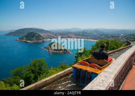 Fairground attraction and overview of the city. San Sebastian, Spain. Stock Photo