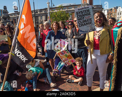 London, UK. 20th September 2019. Schoolchildren, teachers and parents hold a rally in Brixton before going to join the main Earth Day Global Climate Strike inspired by Greta Thunberg in Westminster. Peter Marshall/Alamy Live News Stock Photo
