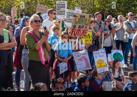 London, UK. 20th September 2019. Schoolchildren, teachers and parents hold a rally in Brixton before going to join the main Earth Day Global Climate Strike inspired by Greta Thunberg in Westminster. Peter Marshall/Alamy Live News Stock Photo