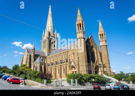 Bendigo, Victoria, Australia - February 27, 2017. Exterior view of Sacred Heart Cathedral in Bendigo, VIC, with cars. Stock Photo