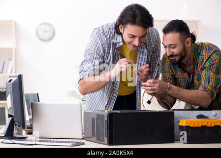 The it engineers working on hardware issue Stock Photo