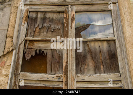 Window of abandoned house in colonial city Stock Photo