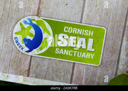 A sign at The Cornish Seal Sanctuary, Gweek, Cornwall, England, UK Stock Photo