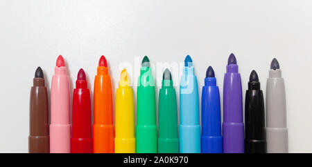 Multi-colored felt-tip pens, markers on a white isolated background. Stock Photo