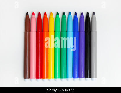 Multi-colored felt-tip pens, markers on a white isolated background. Stock Photo