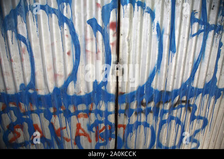Athens Greece Stadiou Street Corrugated Fence with Padlock around Derelict Building with Graffiti on Stock Photo