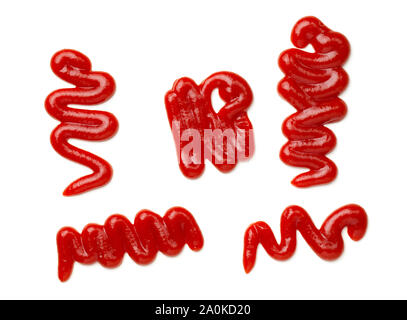 Ketchup splashes isolated on white background. Tomato sauce. Top view, flat lay Stock Photo