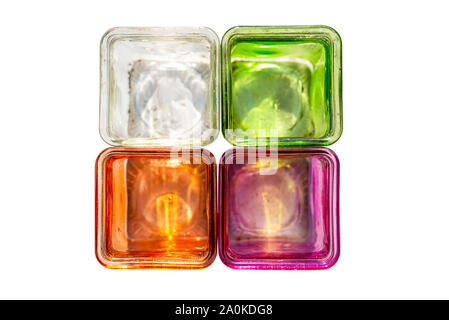 Colored glass coasters for tealights, flat lay, isolated on a white background with a clipping path. Stock Photo