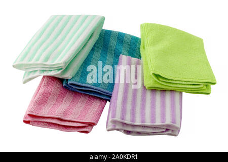 Set of microfiber dust cloths in different colors. Cloths are on a white background. They are cleaning aids. Stock Photo