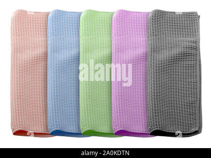 Set of microfiber dust cloths in different colors. Cloths are on a white background. They are cleaning aids. Stock Photo