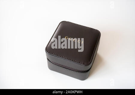 Alicante, Spain -September, 2019: Brown imitation leather jewelry travel Gucci box close up on white background Stock Photo