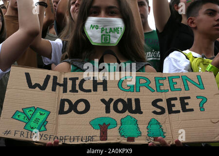 Athens, Greece. 20th Sep, 2019. A Greek student holds a banner during a school strike for climate change in Athens, Greece, on Sept. 20, 2019. The School Strike for Climate on Fridays for Future (FFF) is an international movement of students who take time off from class to participate in demonstrations, in order to prevent further global warming and climate change. In Greece, high school students in 14 cities all over the country decided to skip classes, joining the initiative. Credit: Marios Lolos/Xinhua/Alamy Live News Stock Photo