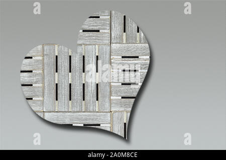 close up of a big gray wooden heart isolated on gray background with gradient Stock Photo
