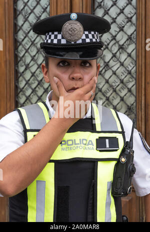 Buenos Aires, Argentina - March 18 2016: A police woman in service in the center streets of Buenos Aires. They work too many hours. Stock Photo