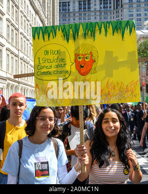 New York, USA,  20 September 2019.  People march through downtown New York city during a Climate Strike rally, as tens of thousands joined the global protest to demand immediate action to fight climate change. Credit: Enrique Shore/Alamy Live News Stock Photo