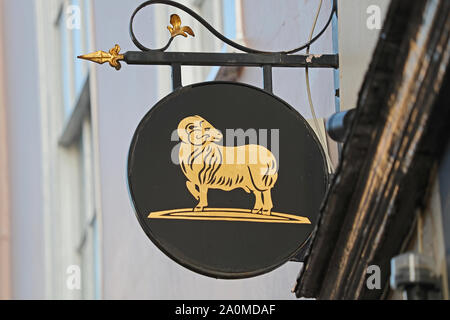 brewer's sign outside a pub called The King's Arms in Oxford on the corner of Holywell Street and Parks Road facing Broad Street representing a ram Stock Photo