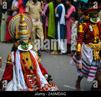 Kathakali artists in Onam procession, Kerala, India Stock Photo