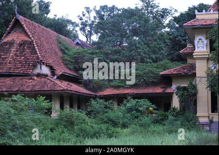 The now defunct & overgrown Hotel Renakse near The Royal Palace, Phnom Penh, Cambodia. credit: Kraig Lieb Stock Photo