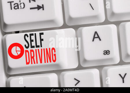 Conceptual hand writing showing Self Driving. Concept meaning Autonomous vehicle Ability to navigate without huanalysis input Keyboard with note paper Stock Photo
