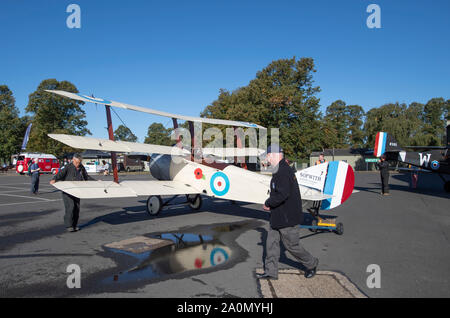 Duxford, Cambridgeshire, UK. 21st Sep, 2019. Themed weekend of flying at IWM Duxford with historic WW1 & WW2 aircraft and a massed flight of Spitfires commemorating the 50th anniversary of the film ‘Battle of Britain'. Image: WW1 Sopwith Triplane of Bremont Great War Display Team wheeled out in preparation for their air display. Credit: Malcolm Park/Alamy Live News Stock Photo