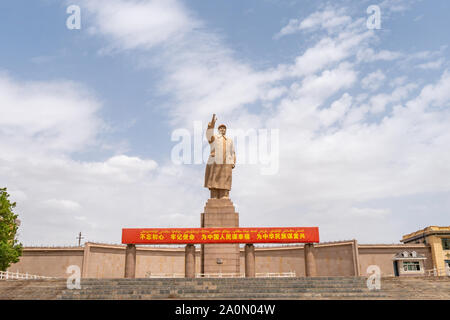 Kashgar Giant Statue of Chairman Mao Zedong at People's Park Square on a Sunny Blue Sky Day Stock Photo
