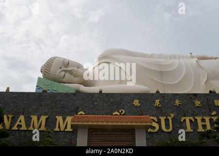 JULY 18, 2019-CAN THO, VIETNAM : Big resting Buddha statue at the Vinh Trang pagoda in the Mekong Delta in Vietnam Stock Photo