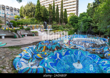 Koreiz, Crimea - July 10. 2019. The territory of sanatorium Miskhor with an ancient fountain with ceramic mosaic tiles Stock Photo